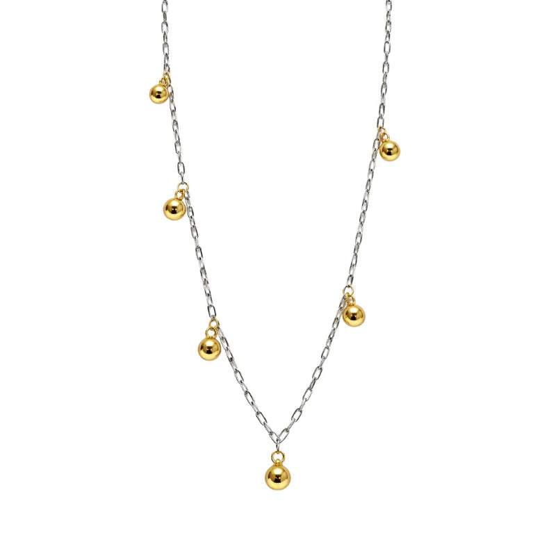 Collar largo de metal con lunares
